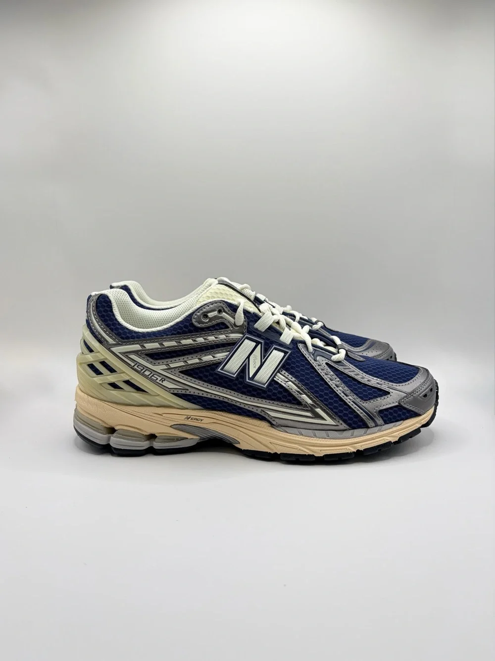 New Balance Navy, Gray & Cream Athletic Sneakers